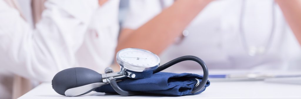 Blood pressure monitor on desk